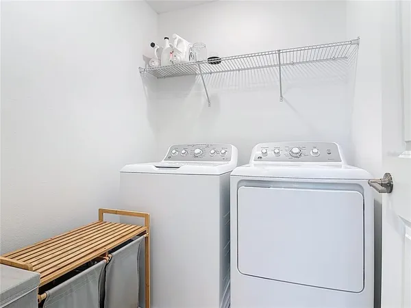 a dining room with furniture and garden view