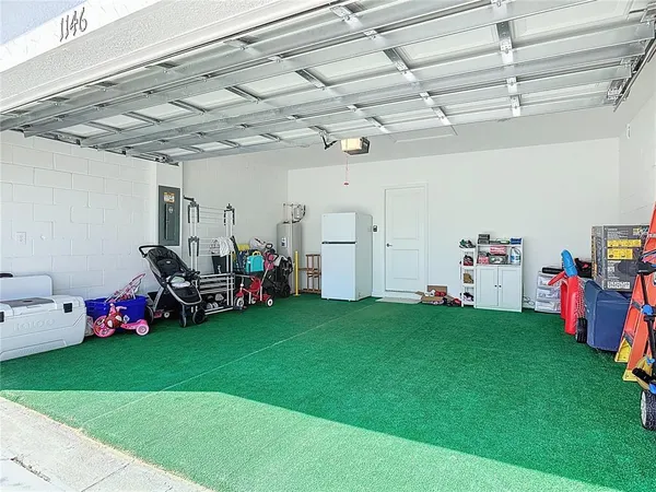 a view of an chairs and table in the patio