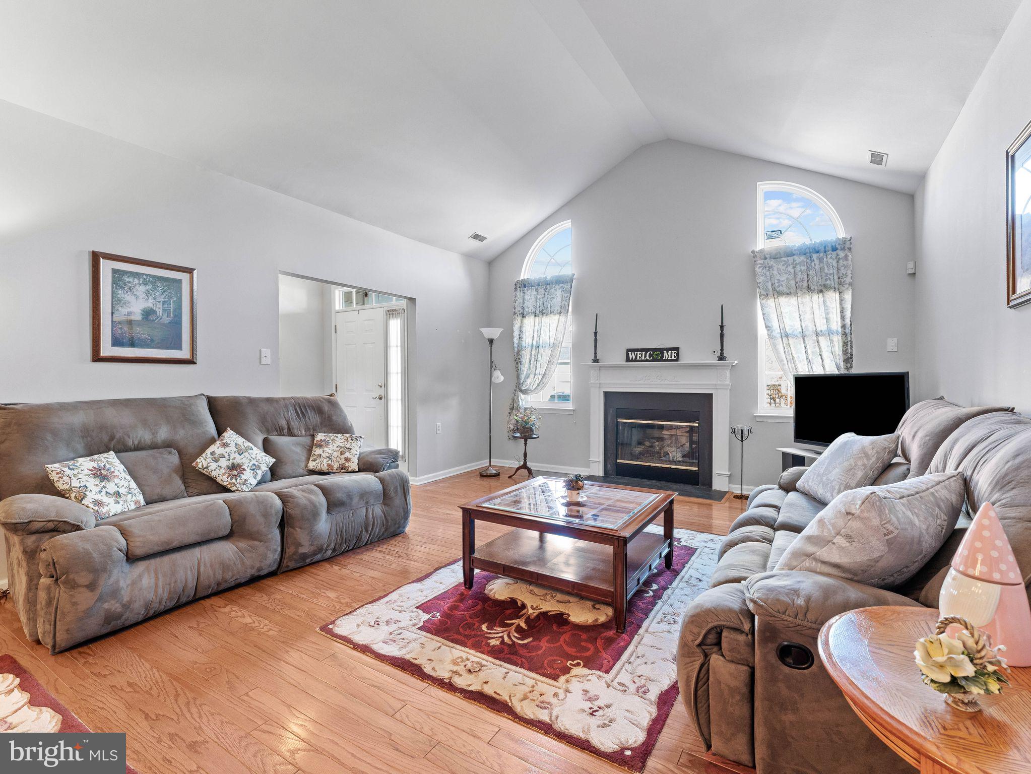 1707 Hulnick Road, Unit 43830 Coatesville, PA 19320 - Photo 12 of 36 a living room with furniture fireplace and window