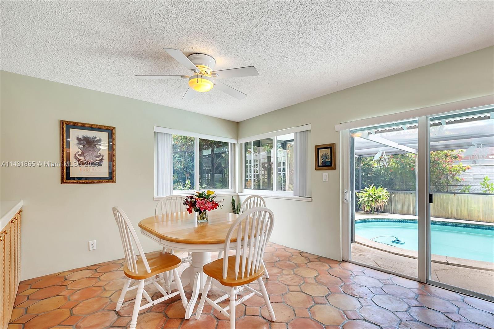13120 Southwest 117th Street Miami, FL 33186 - Photo 14 of 29 a view of a dining room with furniture window and outside view