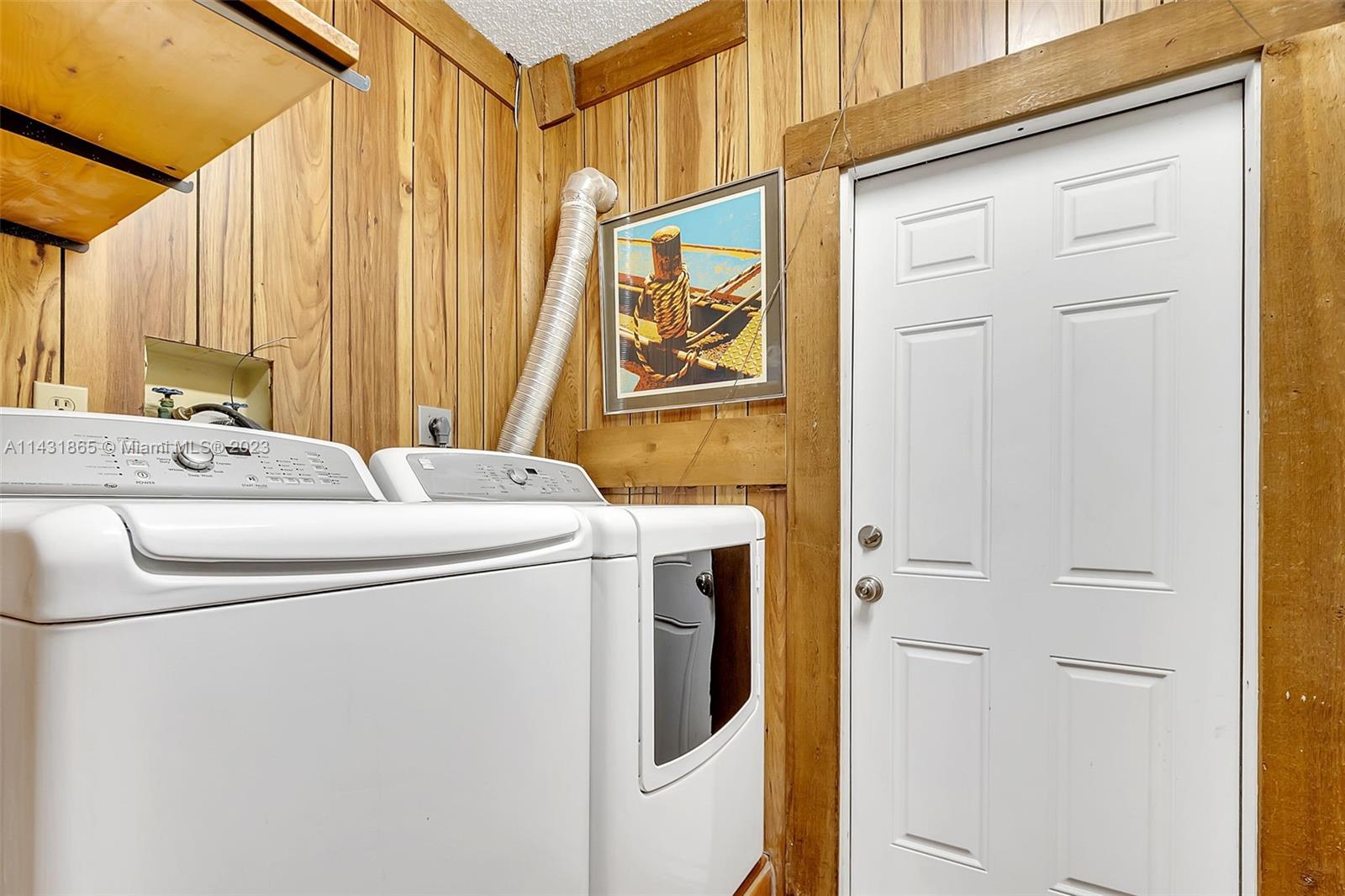 13120 Southwest 117th Street Miami, FL 33186 - Photo 24 of 29 a utility room with dryer and washer