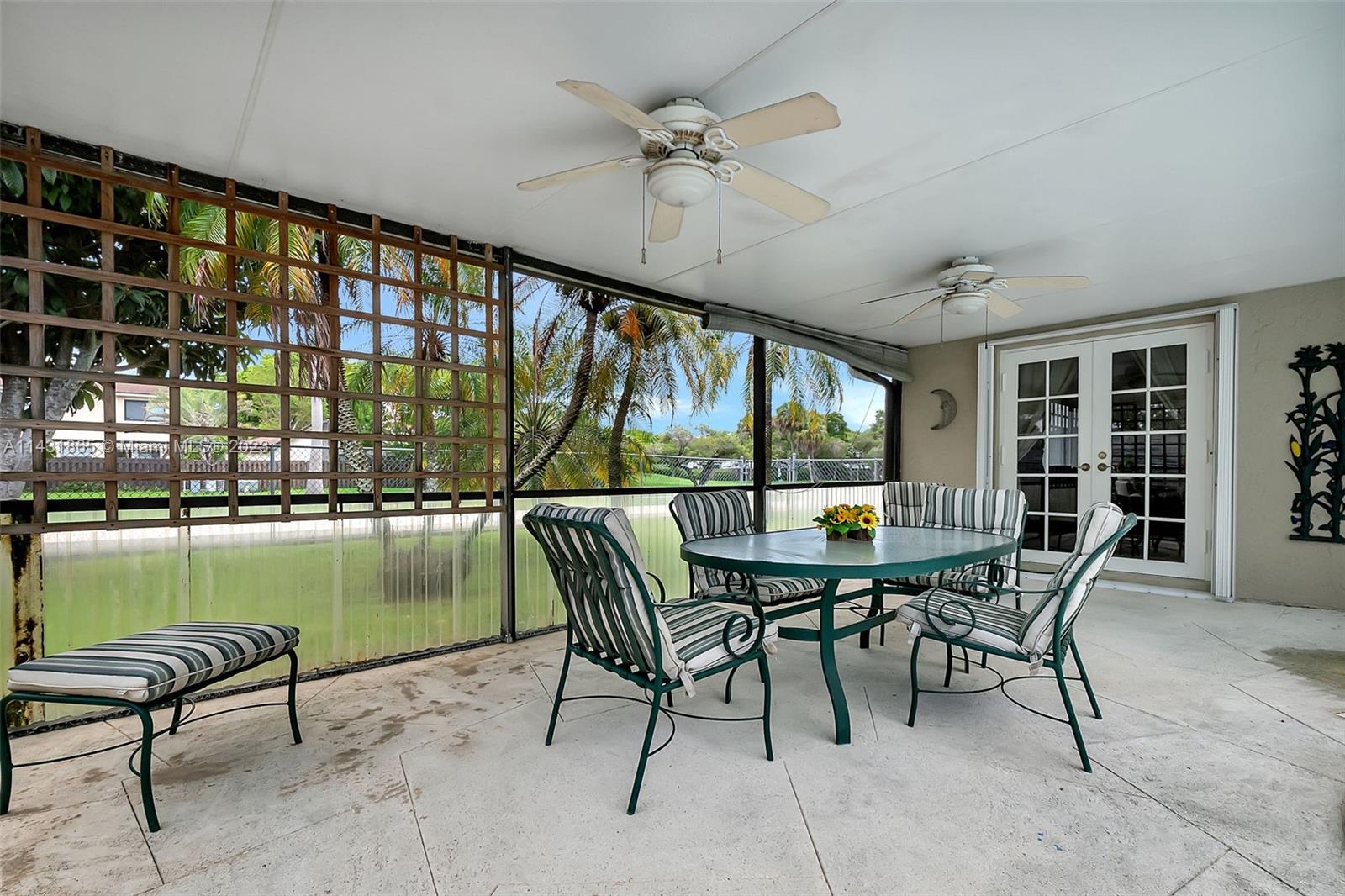 13120 Southwest 117th Street Miami, FL 33186 - Photo 27 of 29 a dining room with furniture and window