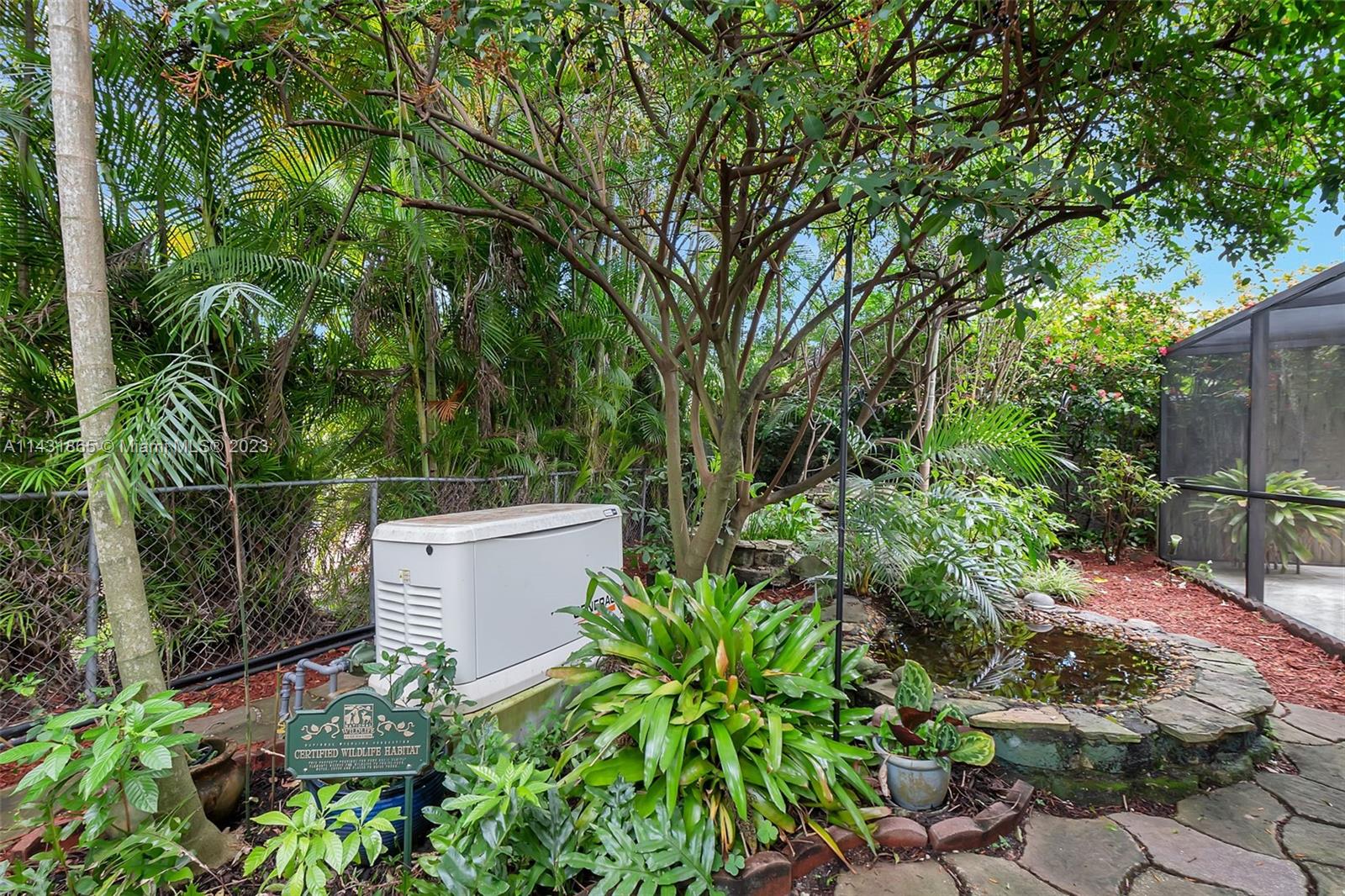 13120 Southwest 117th Street Miami, FL 33186 - Photo 29 of 29 an outdoor space with plants