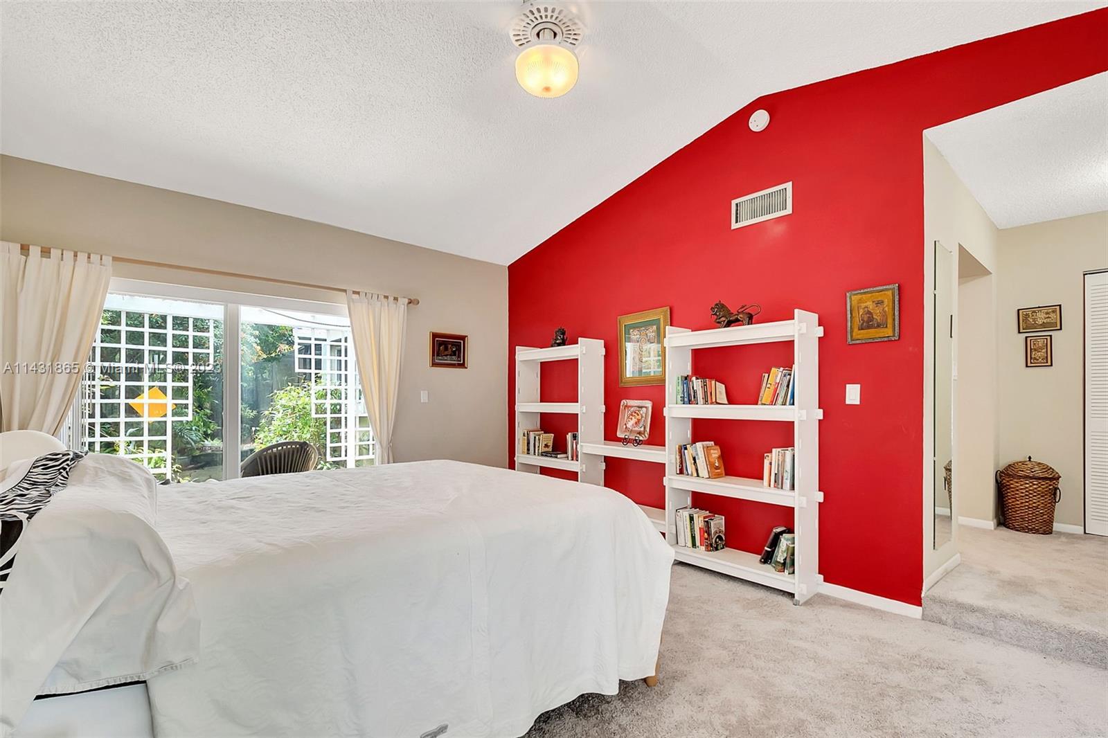 13120 Southwest 117th Street Miami, FL 33186 - Photo 6 of 29 a bedroom with a bed and a closet
