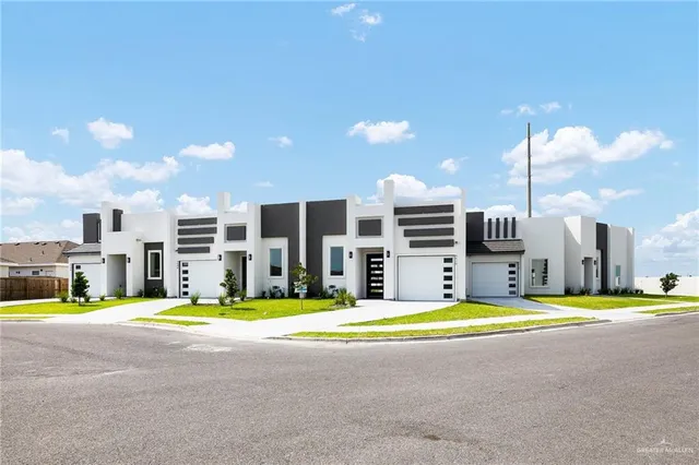 a view of a swimming pool in front of the building