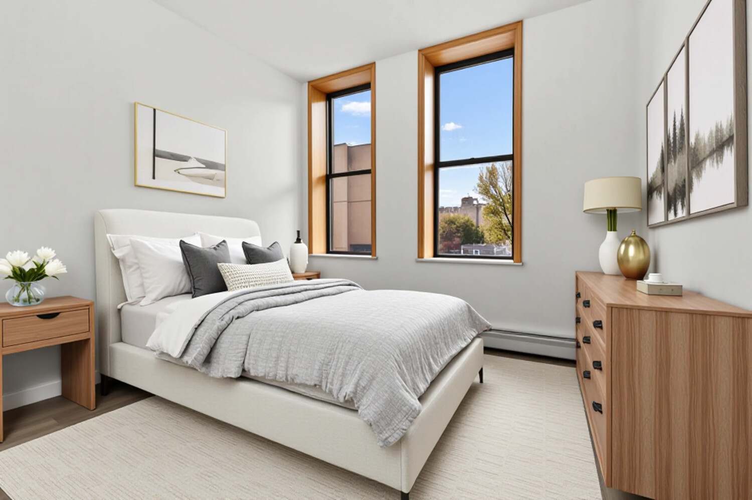 983 Manhattan Avenue, Unit 1 Brooklyn, NY 11222 - Photo 6 of 10 a bedroom with a bed lamp and a window