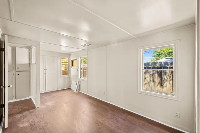 a view of a backyard of the house