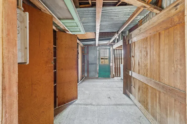 an aerial view of a house with lake view