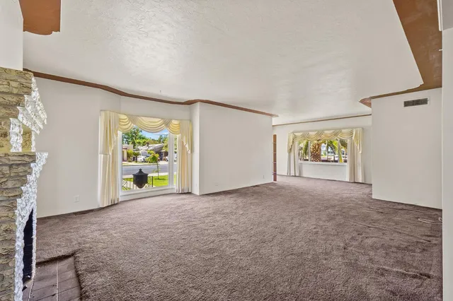 a living room with a fireplace