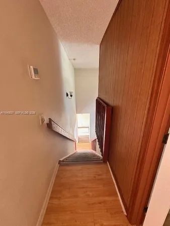 a view of hallway with stairs