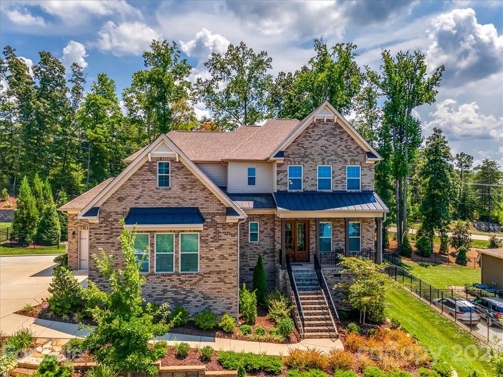 620 Zinnia Way Tega Cay, SC 29708 - Photo 2 of 39 a front view of a house with garden