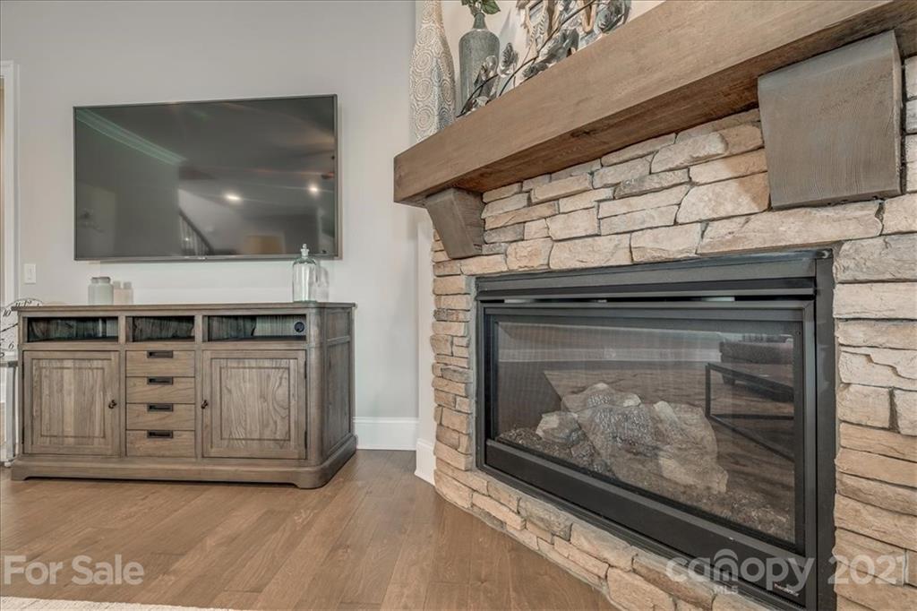 620 Zinnia Way Tega Cay, SC 29708 - Photo 11 of 39 a room with fireplace