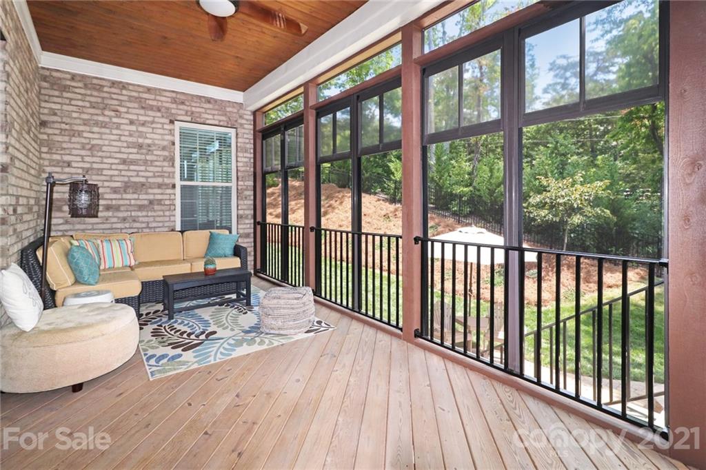 620 Zinnia Way Tega Cay, SC 29708 - Photo 16 of 39 a living room with furniture and a large window