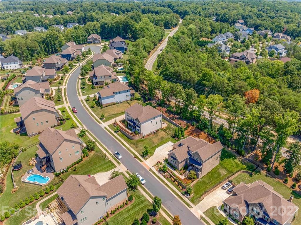 620 Zinnia Way Tega Cay, SC 29708 - Photo 34 of 39 an aerial view of residential house with outdoor space and swimming pool