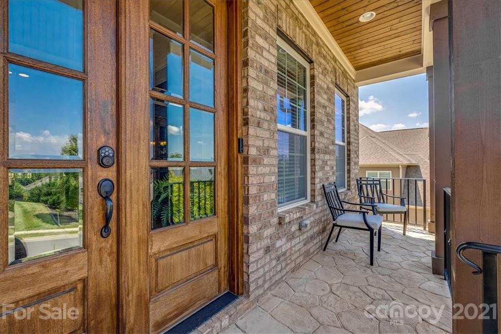 620 Zinnia Way Tega Cay, SC 29708 - Photo 5 of 39 a view of a balcony with chairs