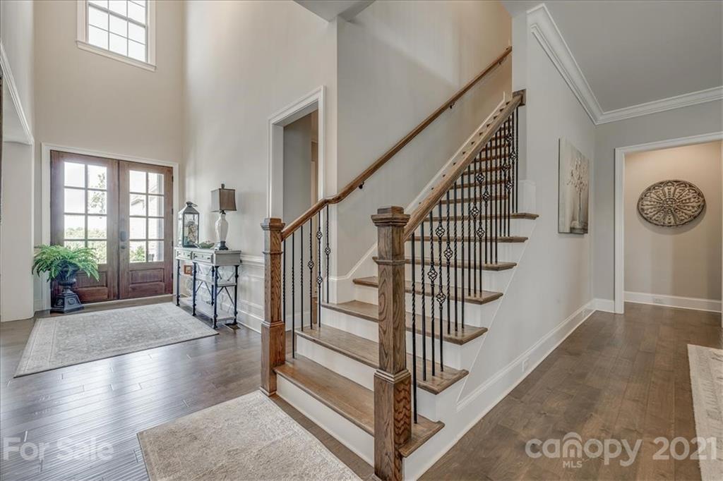 620 Zinnia Way Tega Cay, SC 29708 - Photo 6 of 39 a view of entryway and hall with wooden floor