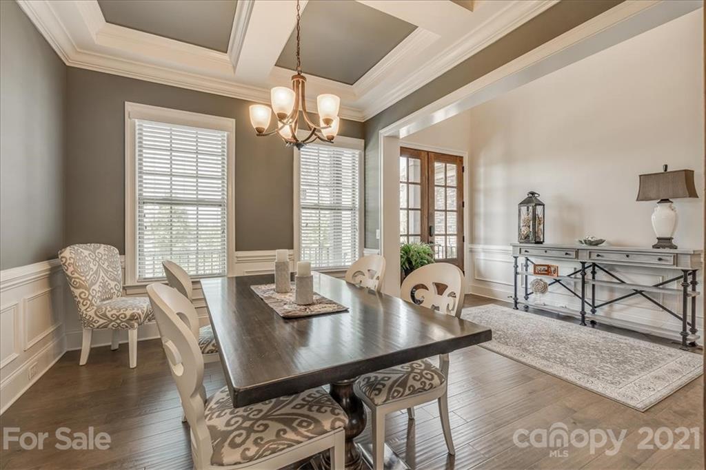 620 Zinnia Way Tega Cay, SC 29708 - Photo 8 of 39 a view of a dining room with furniture