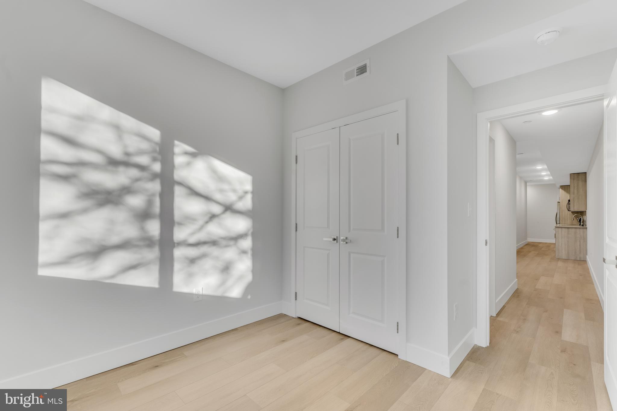 1243 West Westmoreland Street, Unit 2 Philadelphia, PA 19140 - Photo 12 of 18 a view of an empty room and window