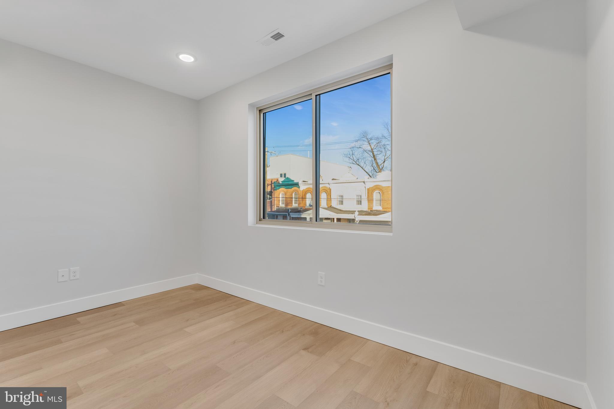 1243 West Westmoreland Street, Unit 2 Philadelphia, PA 19140 - Photo 16 of 18 a view of empty room with window