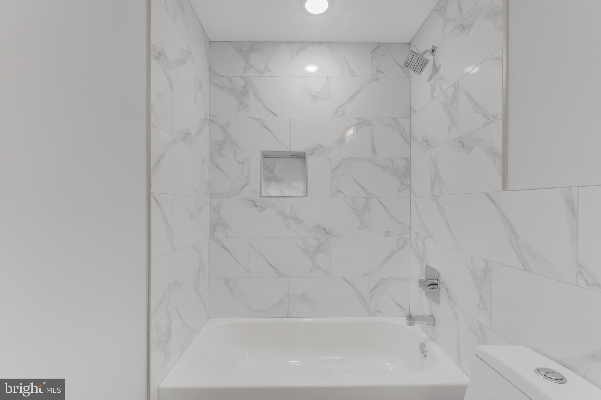 1243 West Westmoreland Street, Unit 2 Philadelphia, PA 19140 - Photo 18 of 18 a bathroom with a shower and a toilet