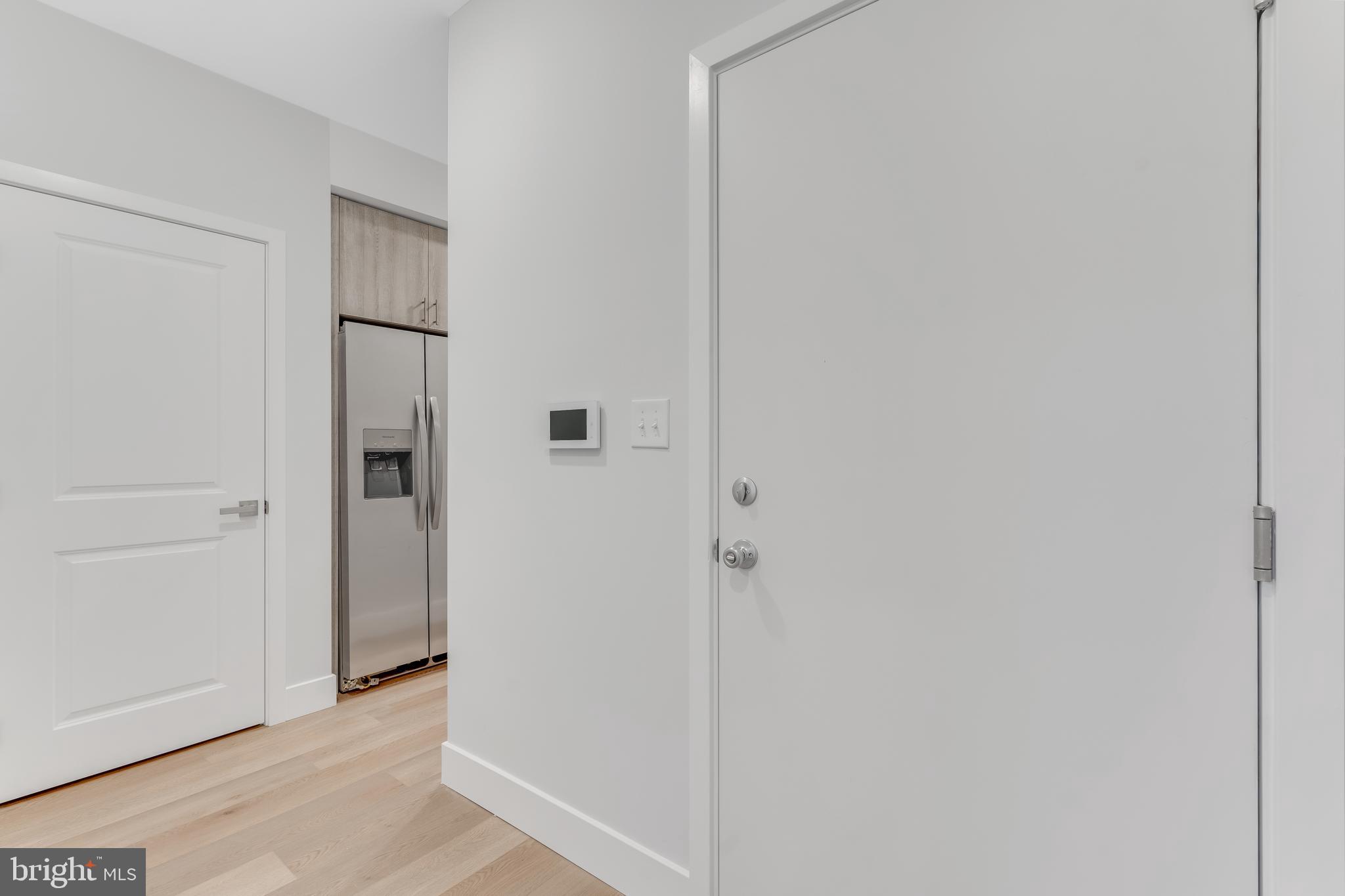 1243 West Westmoreland Street, Unit 2 Philadelphia, PA 19140 - Photo 7 of 18 a view of a hallway