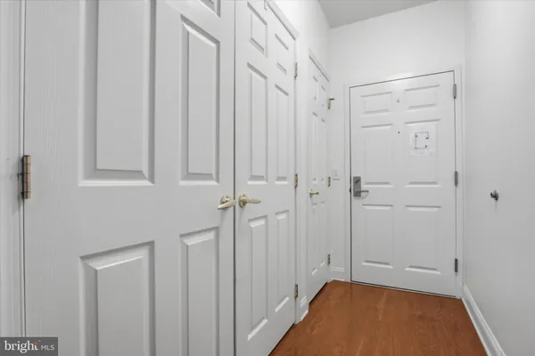 a view of room with hardwood floor