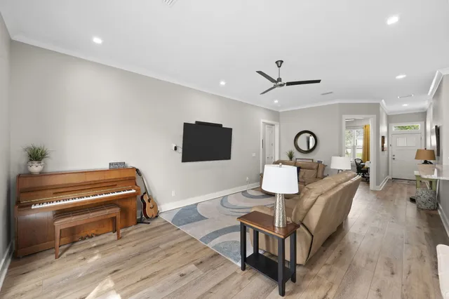 a kitchen with granite countertop white cabinets stainless steel appliances and sink