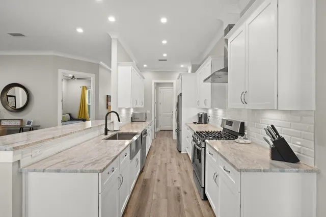 a bedroom with furniture and a book shelf