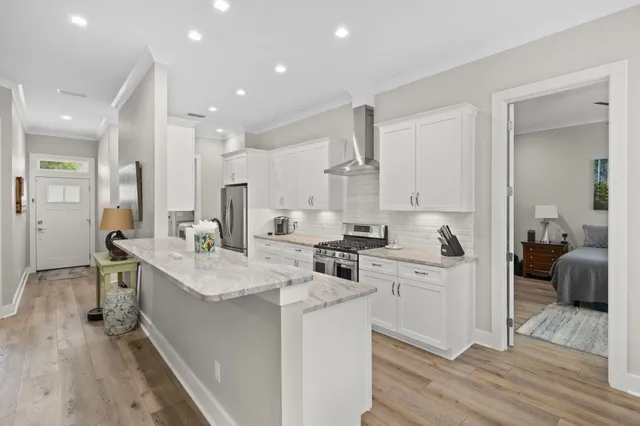 a bedroom with furniture and a book shelf