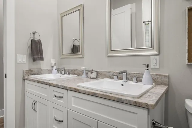 a view of a backyard with a patio