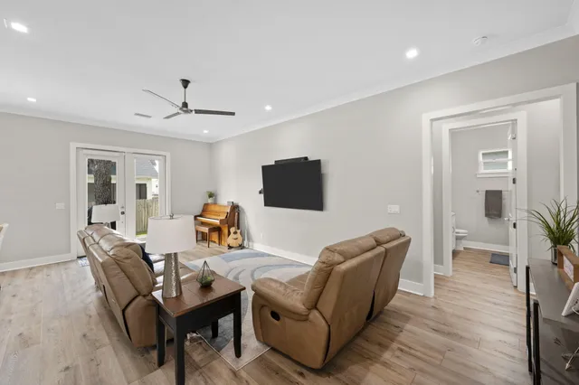 a kitchen with sink and refrigerator