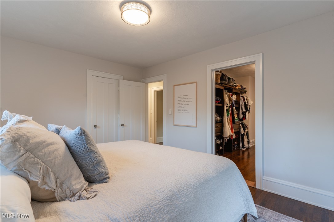 2890 Huntington Road Cleveland, OH 44120 - Photo 21 of 41 Bedroom with dark hardwood / wood-style floors and a spacious closet