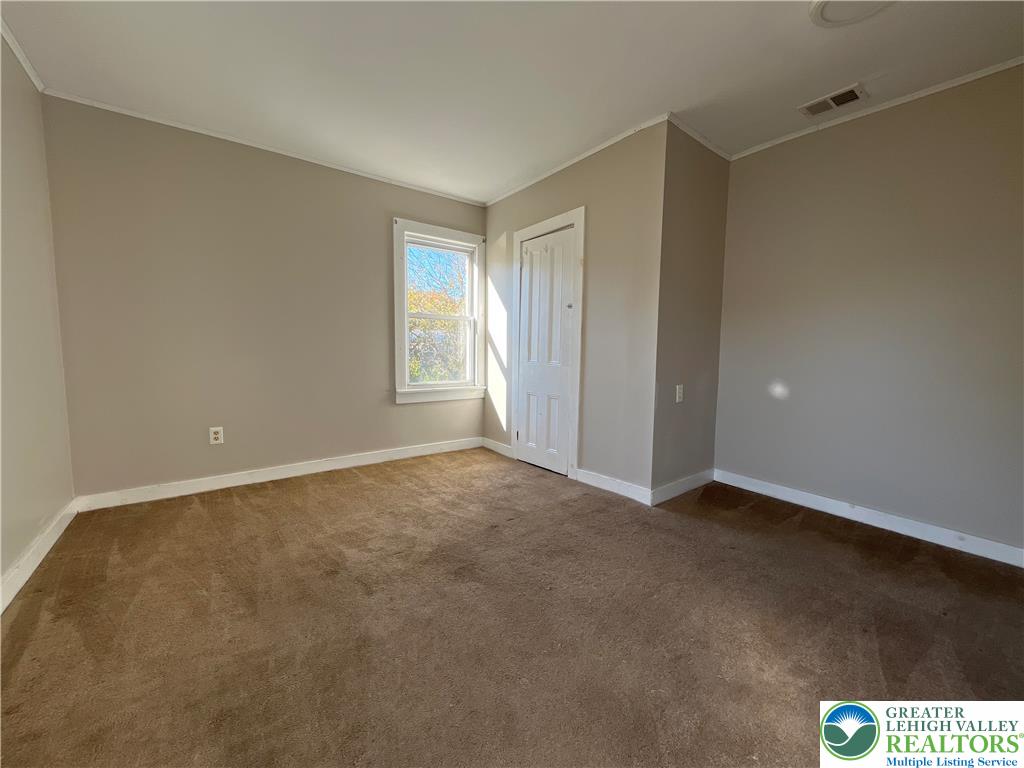 25 South 13th Street, Unit 2 Easton, PA 18042 - Photo 11 of 16 a view of an empty room with a window