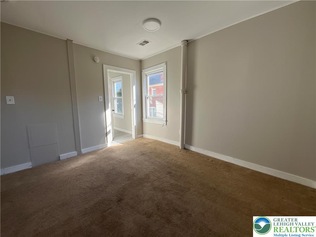 25 South 13th Street, Unit 2 Easton, PA 18042 - Photo 10 of 16 a view of an empty room with a window