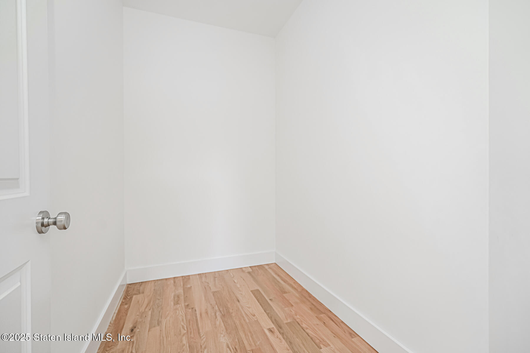 291 Rensselaer Avenue Staten Island, NY 10312 - Photo 15 of 38 a view of a small space with wooden floor