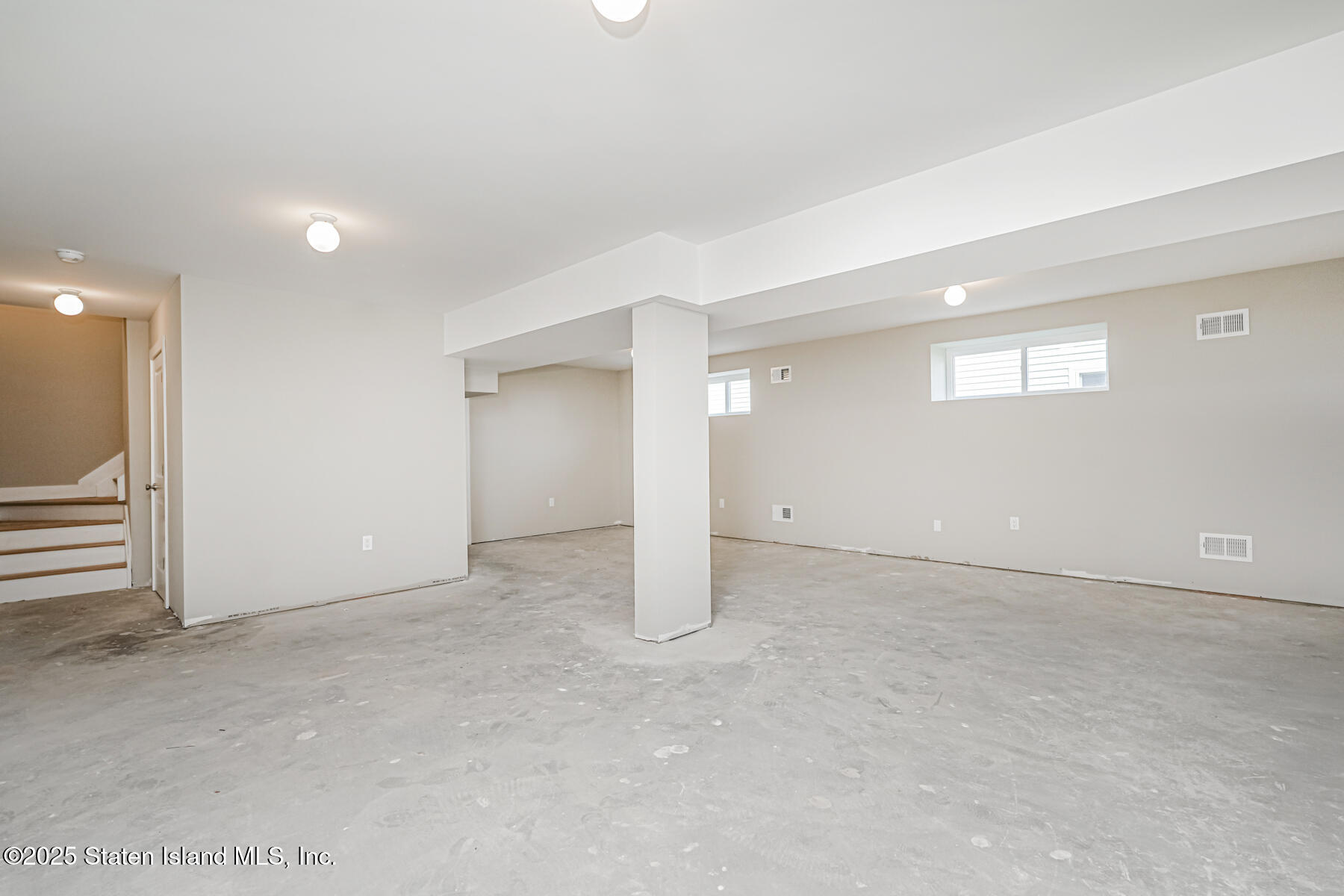 291 Rensselaer Avenue Staten Island, NY 10312 - Photo 32 of 38 an empty room with entrance and empty room