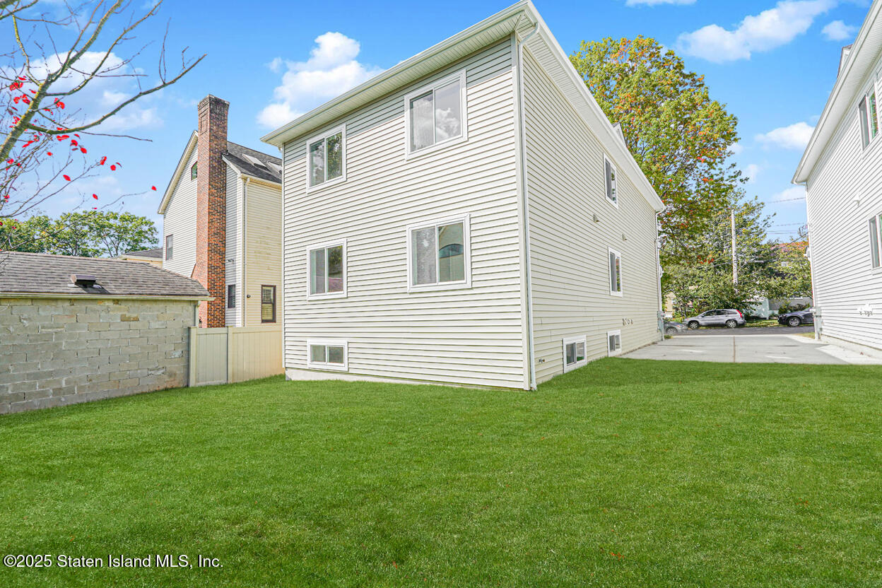 291 Rensselaer Avenue Staten Island, NY 10312 - Photo 37 of 38 a view of backyard with a garden and plants