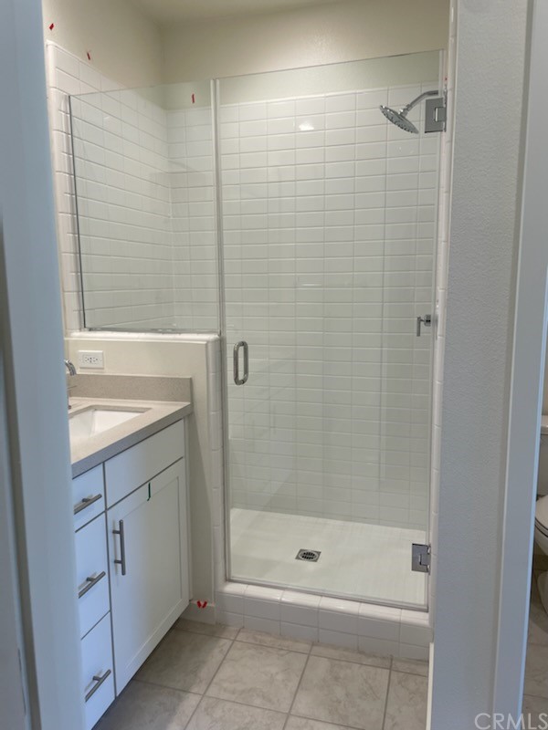 208 Winterbrook Lake Forest, CA 92610 - Photo 5 of 5 a bathroom with a shower and a sink
