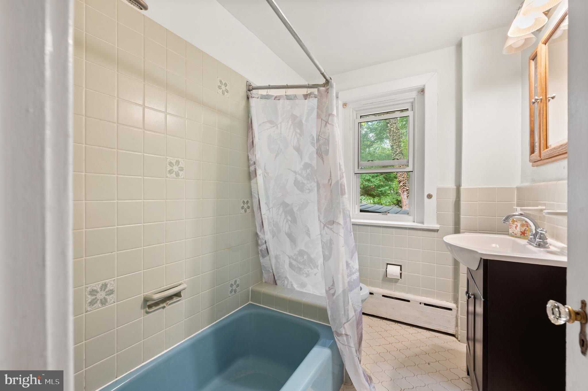 120 Diamond Rock Road Phoenixville, PA 19460 - Photo 29 of 86 a bathroom with a sink a toilet and shower