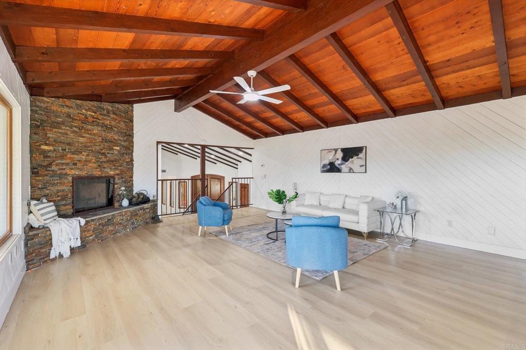 2865 Via Dieguenos Alpine, CA 91901 - Photo 25 of 75 a living room with furniture and a fireplace