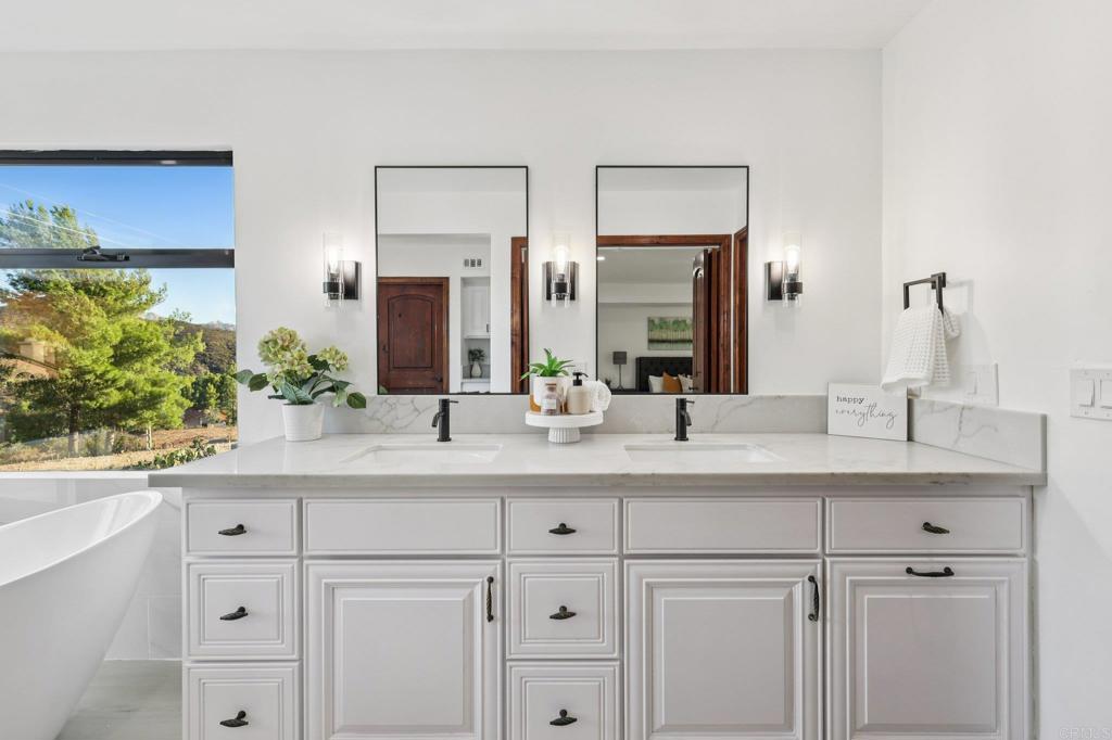 2865 Via Dieguenos Alpine, CA 91901 - Photo 33 of 75 a bathroom with a sink and a mirror