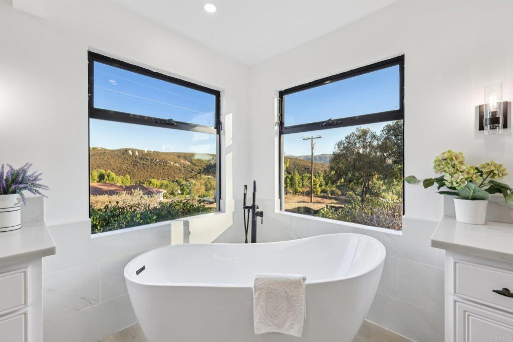 2865 Via Dieguenos Alpine, CA 91901 - Photo 35 of 75 a white bath tub sitting in a bathroom