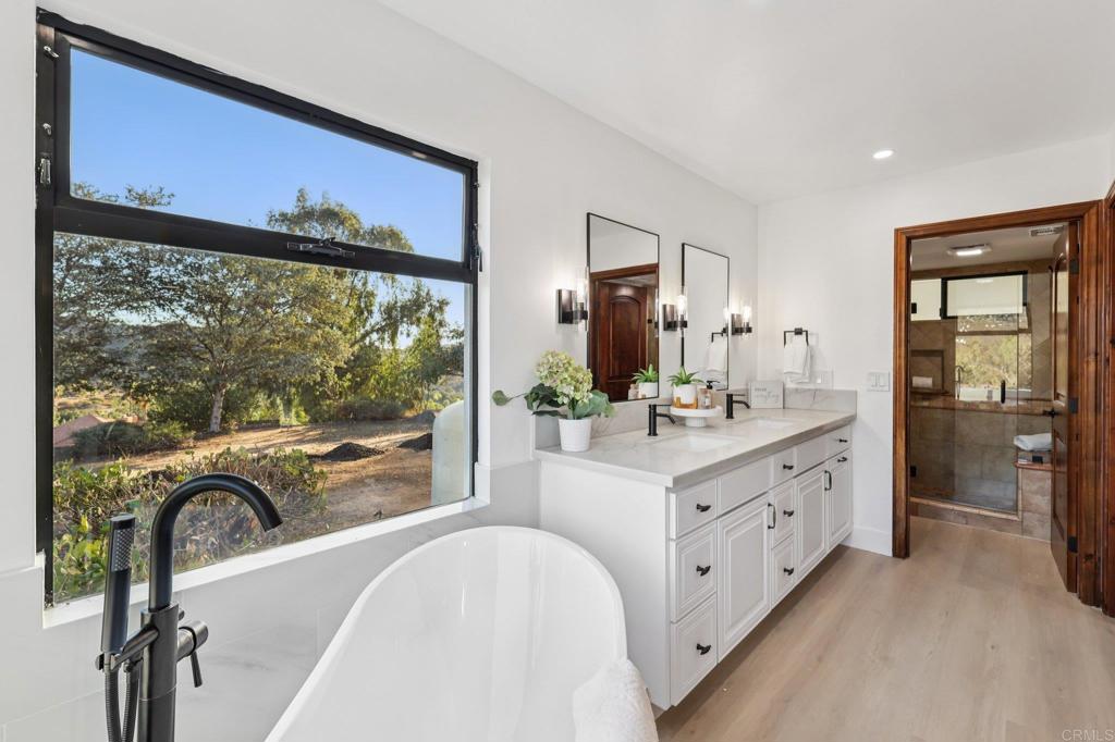 2865 Via Dieguenos Alpine, CA 91901 - Photo 37 of 75 a bathroom with a double vanity sink mirror and double