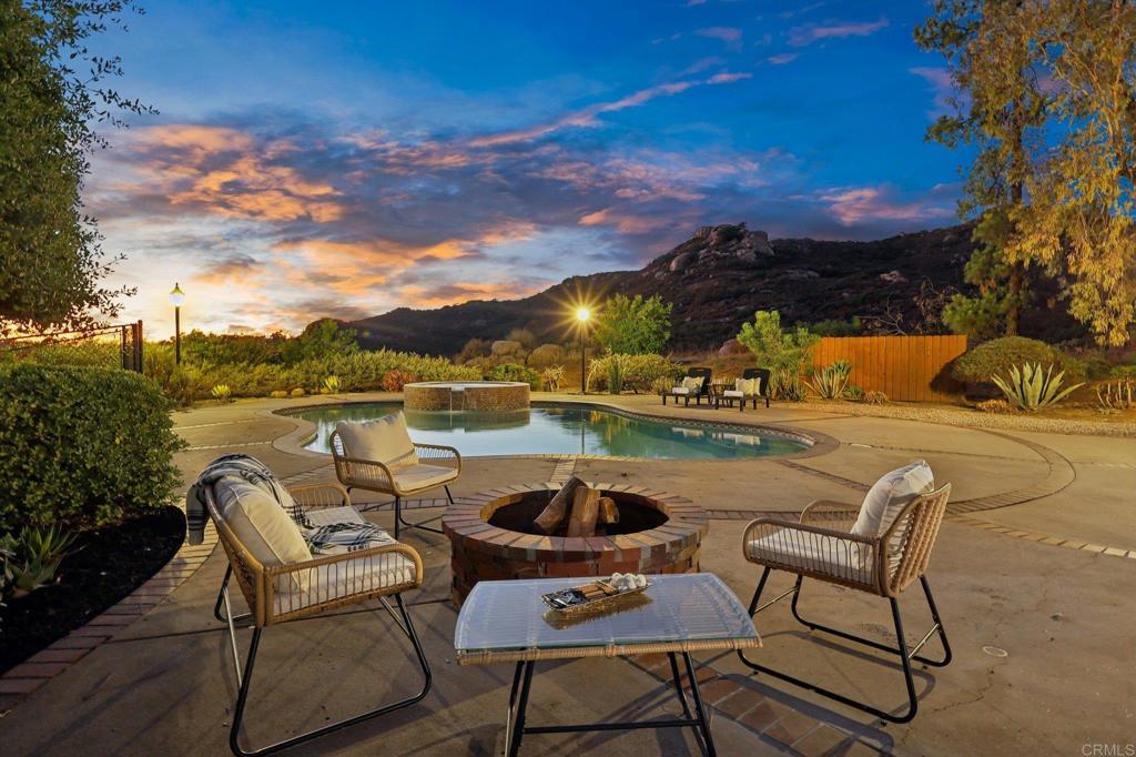 2865 Via Dieguenos Alpine, CA 91901 - Photo 48 of 75 a view of a chairs and table in patio with a lake view