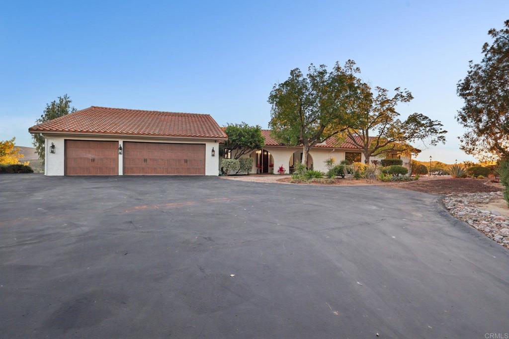 2865 Via Dieguenos Alpine, CA 91901 - Photo 60 of 75 a front view of a house with a yard