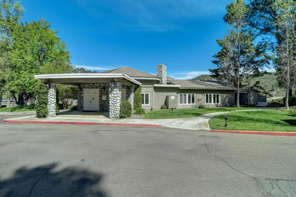 2865 Via Dieguenos Alpine, CA 91901 - Photo 65 of 75 front view of a brick house with a yard