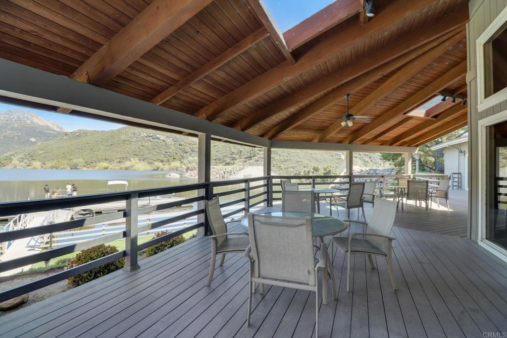 2865 Via Dieguenos Alpine, CA 91901 - Photo 67 of 75 a view of a chairs and table in patio with wooden floor