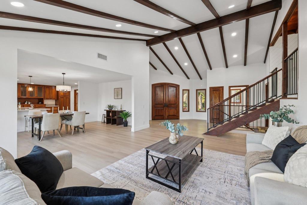 2865 Via Dieguenos Alpine, CA 91901 - Photo 7 of 75 a living room with furniture and a chandelier