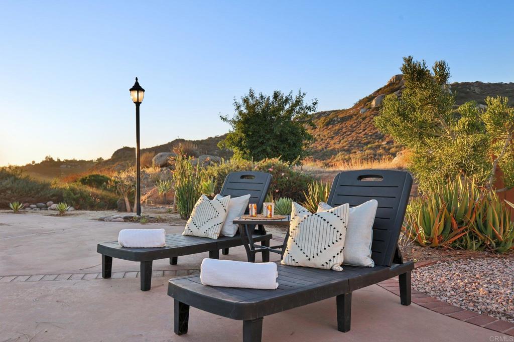 2865 Via Dieguenos Alpine, CA 91901 - Photo 8 of 75 a view of a chairs and table on the terrace