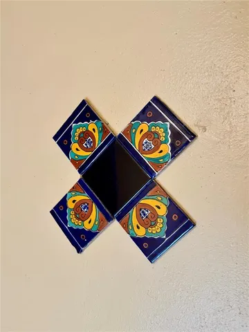 with street sign on the wall and painting on the wall